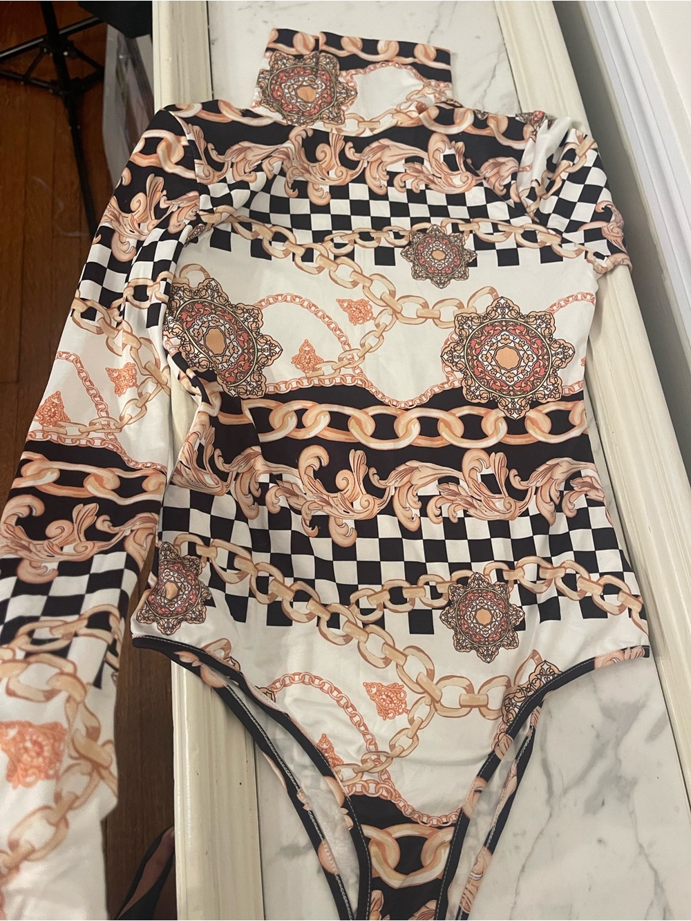 Long-Sleeve Printed Bodysuit in Black and Cream